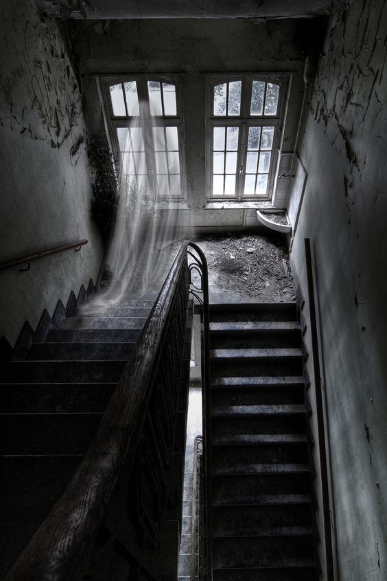 Ghost on stairs (image is symbolic)