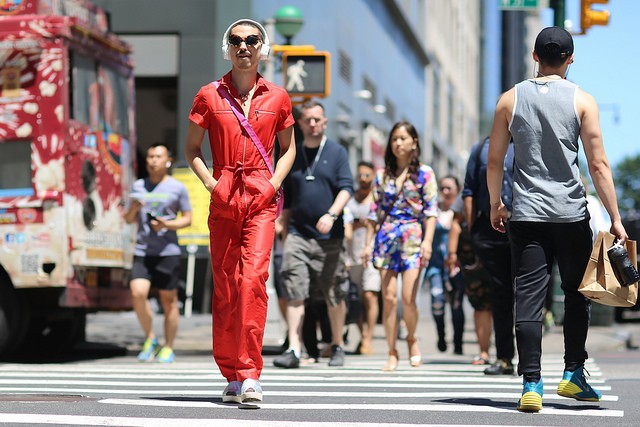 Throwback to Summer 2018 (Gallery) 5 A guy crossing 57th Street along 8th Avenue.